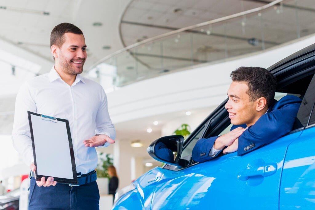 portrait-salesman-car-dealership