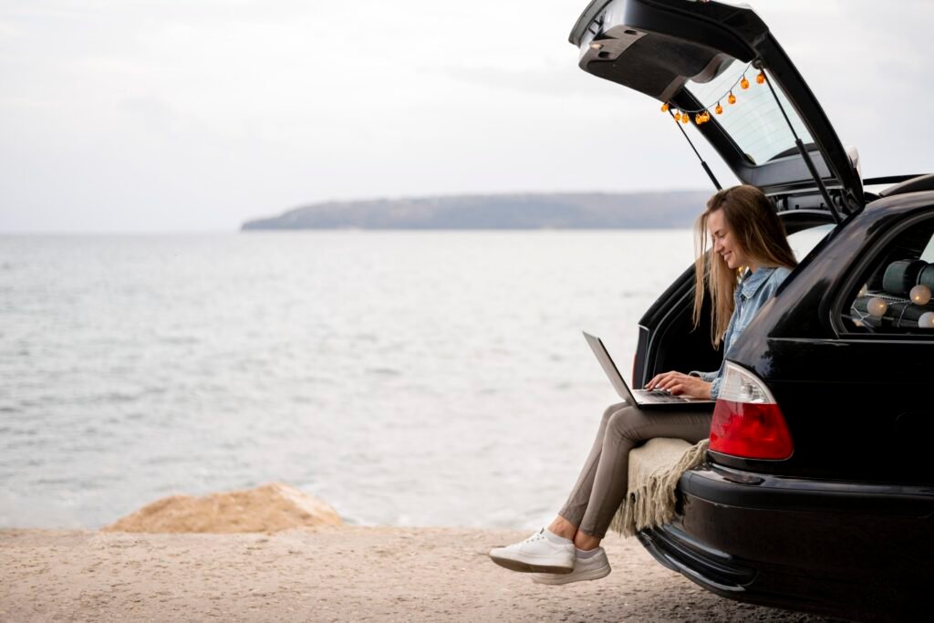 young-woman-enjoying-road-trip